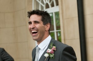 laughing groom